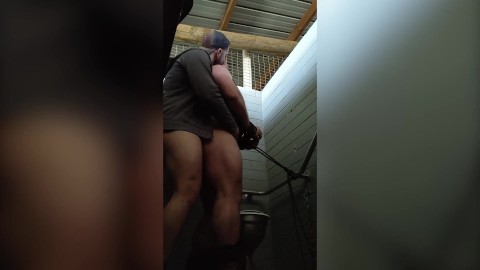 Fucking a muscle slut in the public toilets bareback