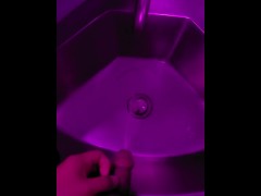 Pissing in the bar sink 