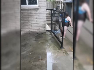 Chub Sissy Exposed in Womans Swim Suit in The Rain