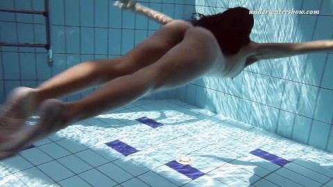 Gypsy black haired babe swimming underwater