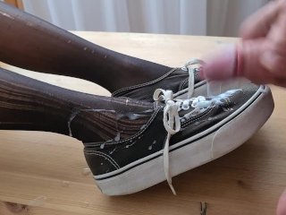 Cumming on her lovely Vans boots