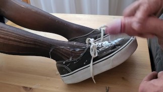 Cumming on her lovely Vans boots