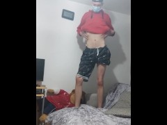 Sexy lad wearing layers of clothes with Perfect skinny body does strip tease