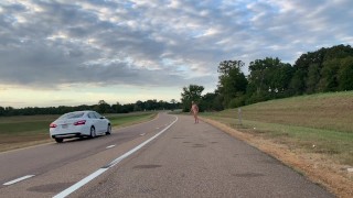Walking naked along side of interstate. Several cars passed and saw me.