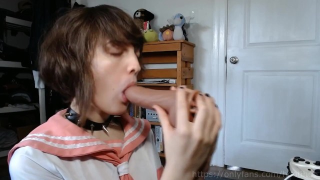 Femboy Schoolgirl gives a Blowjob to his Toy