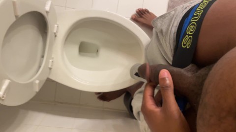 Thirsty? Have a sip - black boy pisses in toilet