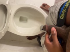 Thirsty? Have a sip - black boy pisses in toilet