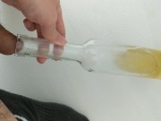 Preview 5 of Filling up a wine bottle with piss
