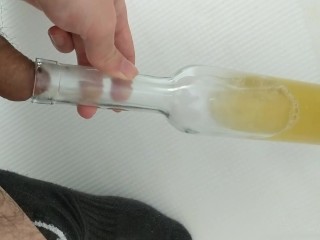 Filling up a Wine Bottle with Piss