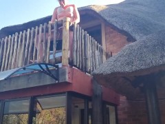 Bikini slut pissing from a balcony