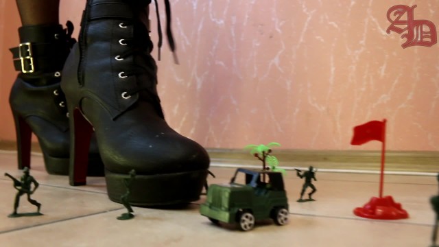 TRANNY GIANTESS CRUSHES ARMY OF TOY SOLDIERS IN HIGH HEELS BOOTS AND MINI SKIRT (CRUSH FETISH)