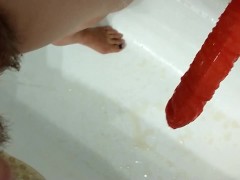 Pissing on dildo by request