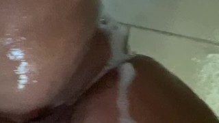 Playtime in the shower. Tits and pussy fun