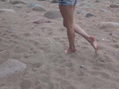 Outdoors foot play on the beach