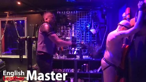 English Leather Master flogs on St Andrews Cross in dungeon PREVIEW