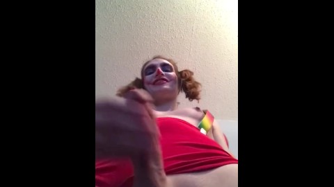 Sexy clown masturbates cock over your face