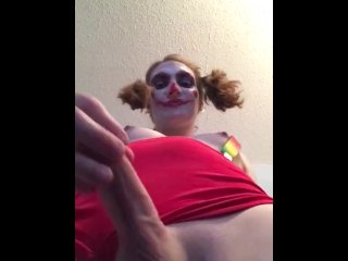 Sexy clown masturbates cock over your face