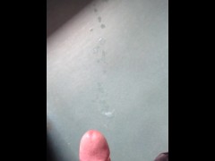Long distance cumshot in the sunshine