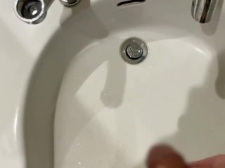 Peeing on bathroom sink