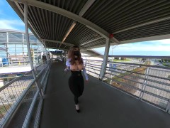 Crossdresser flashing in a train station