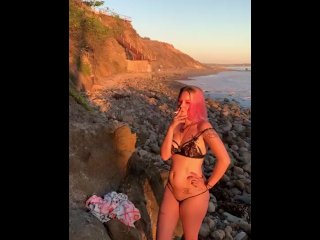 at the beach, pierced nipples, smoking fetish, dyed hair
