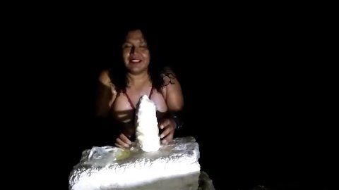 Fat tranny Elizabeth gets her anus dilated with a giant piece of plastic by the sea