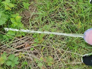 Piss in nature with chastity belt