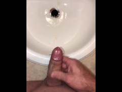 Naughty Pissing and Cumming in my bathroom sink featuring a bullseye cumshot into the drain