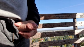 Teen jerking off on a public lookout tower near the city