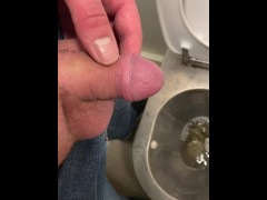 Small dick guy pissing in the train