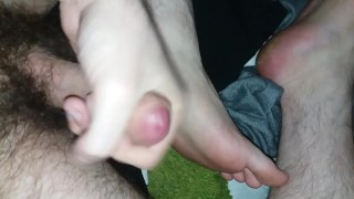 Jerking-off with my foot. Cumshot on my soles