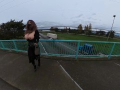 Crossdresser flashing on a highway bridge