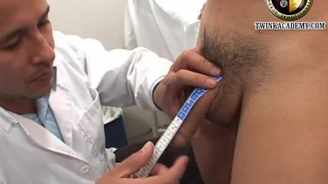 The campus doctor measures the Latino boy's uncut cock