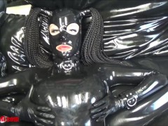 Video Latex doll gets two orgasms on rubber bed