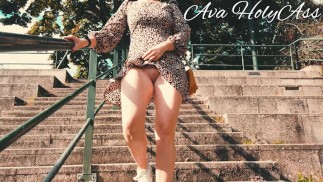 MILF flashing her ass and pussy on public stairs