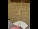 Pissing on the floor of my dorm bathroom