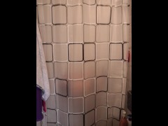 Horny girl dance while she undressed behind the shower curtain