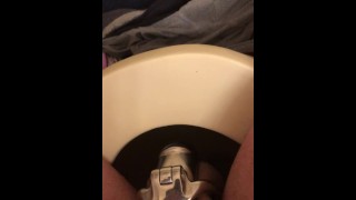 Hot Guy with big dick peeing with chastity on.
