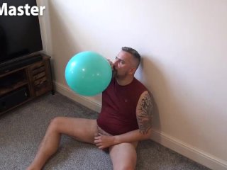 DILF blows up three balloons, pops one and cums on the other two PREVIEW