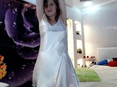Beautiful redhead dance tease in Satin white dress with transparent panties