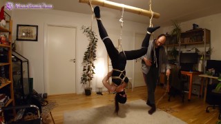 Shibari play session with suspension in butterfly harness and spanking thumbnail