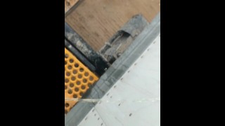 Peeing on a trailer at work