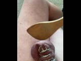 Caged boy gets his balls busted with wooden spoon