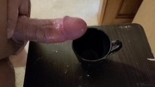 Filling a cup with cum part 2