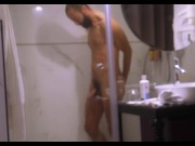 Preview 2 of Mature dude filmed from outside while taking a shower and jerking off his hard cock