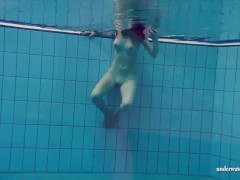 Fun naked girls get naughty in the pool