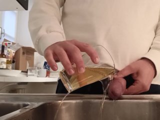 pissing in a glass