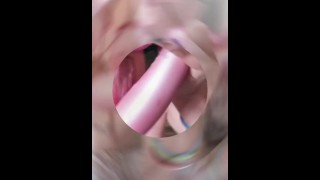 Slut cums all over vibrator toy, licks her own thick cum!