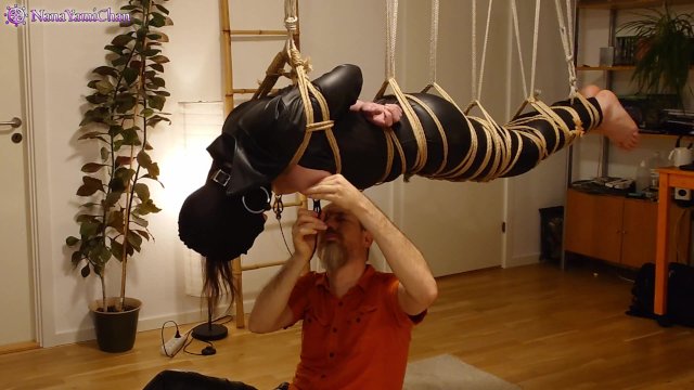 Watch Bondage Video:Girl in leather catsuit gets Shibari energy tied, suspended, nipple clamps. Real uncut play!