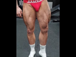 Ripped bodybuilder flexing hard oiled muscles  muscle worship